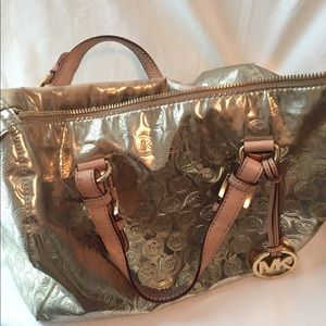 Michael Kors gold Dr bag